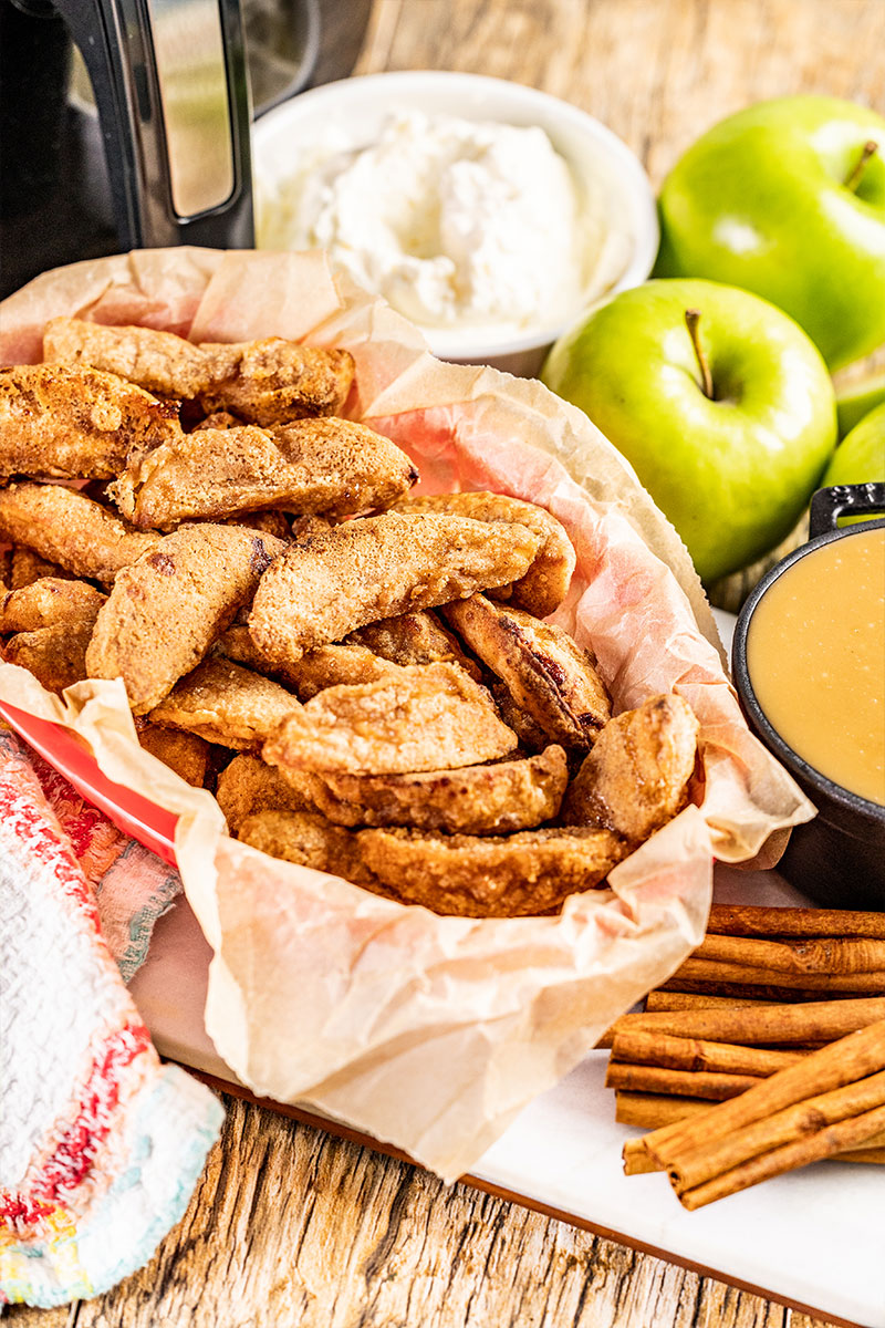A basket filled with apple fries.