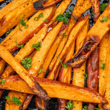 Overhead close up view of air fryer sweet potato fries.