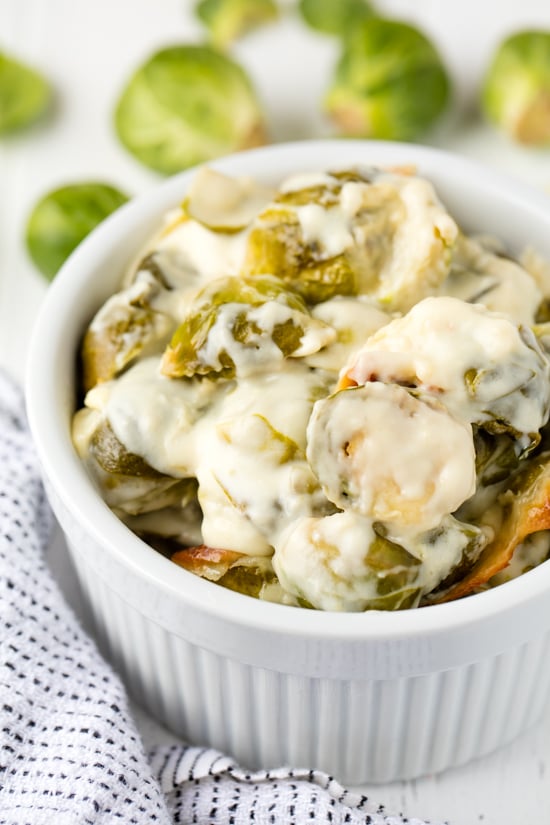 Brussel Sprouts Au Gratin with a creamy au gratin sauce, served in a bowl