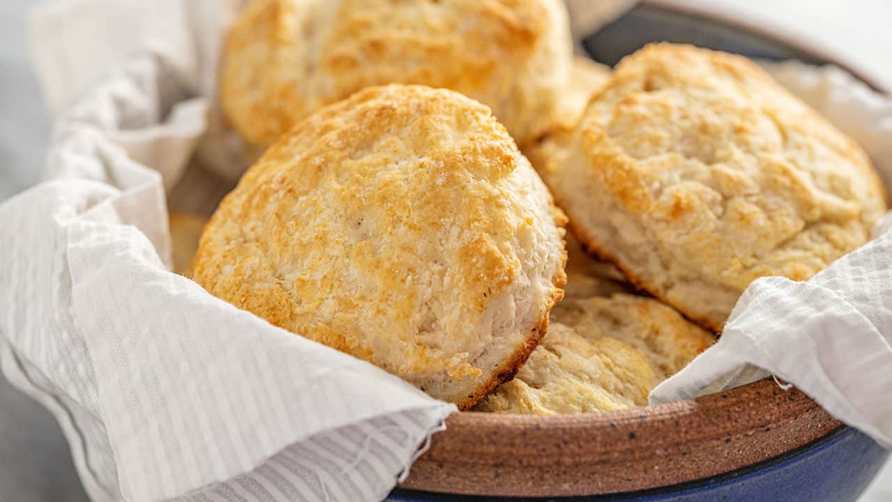 A bowl of freshly baked Flaky Old Fashioned Biscuits