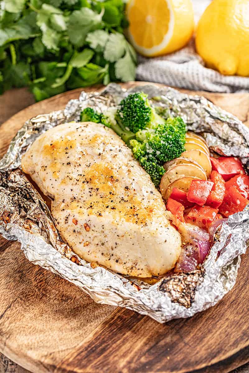 Cheesy ranch chicken breast and veggies in a foil packet.