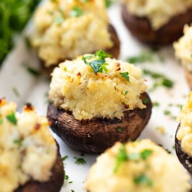 Crab Stuffed Mushrooms on a white plate.