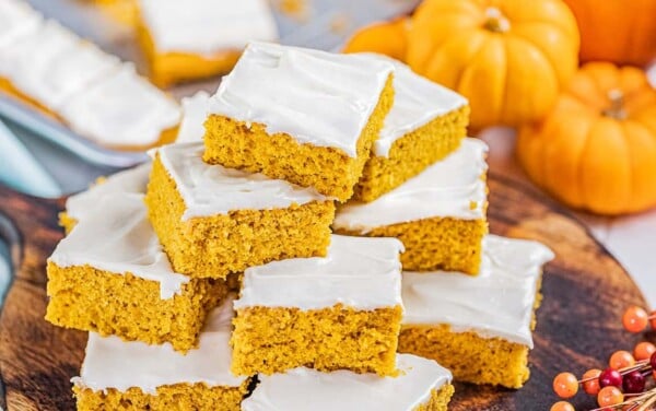 A large stack of pumpkin bars.