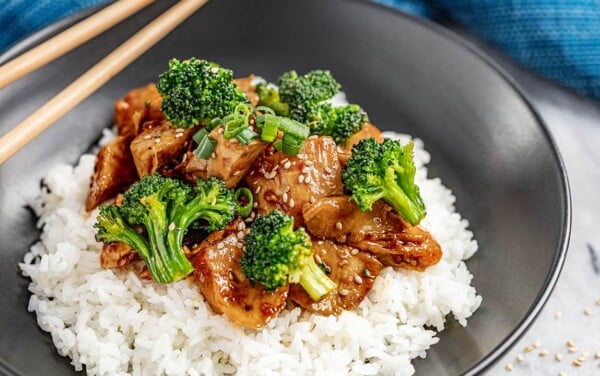 Chicken teriyaki cubed over a bed of white rice.