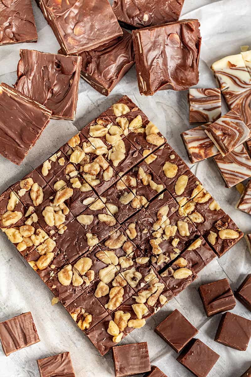 cut up homemade fudge with nuts.