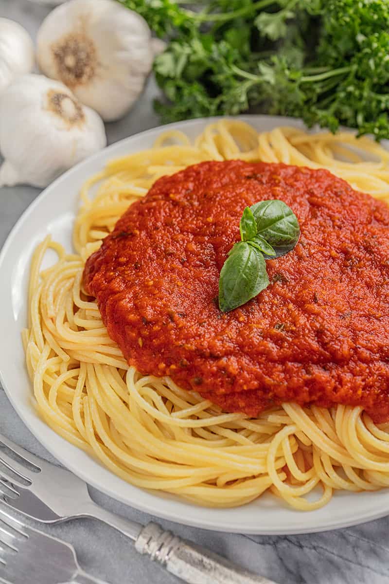 Spaghetti noodles and spaghetti sauce.