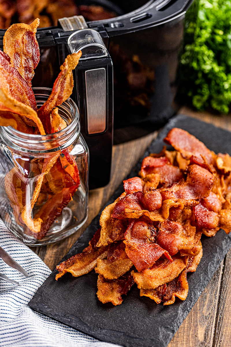 Air fried bacon in a glass jar.