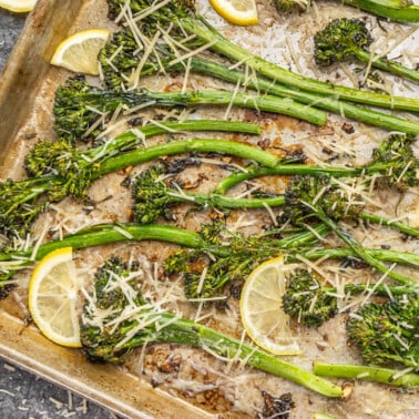 Pan roasted broccolini on a baking sheet.