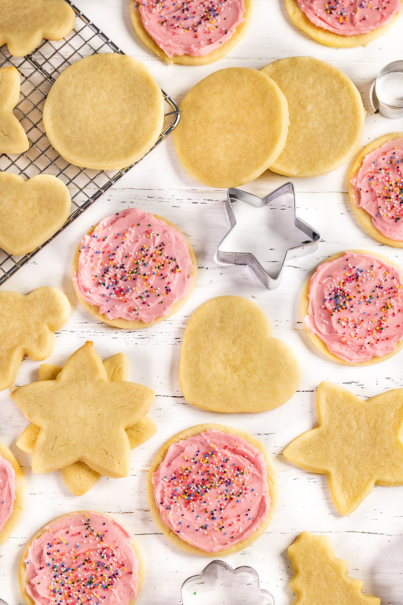 Overhead view of a bunch of sugar cookies on a counter.