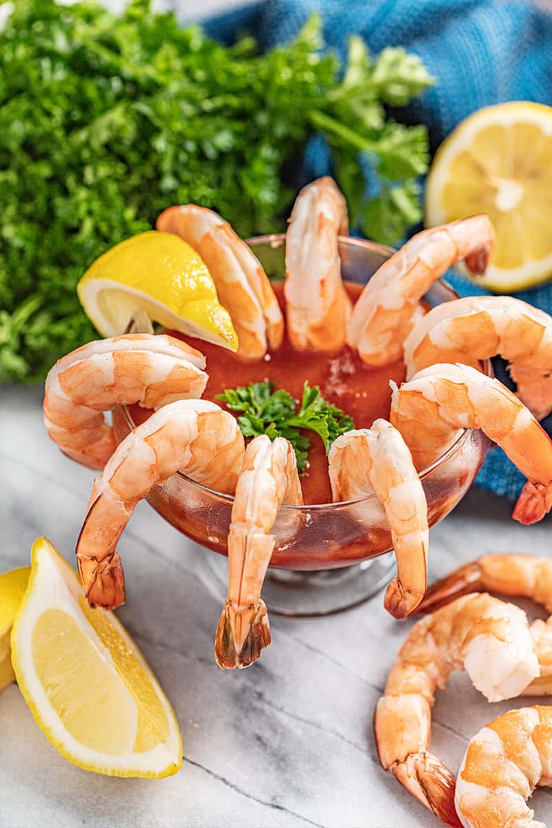 Shrimp cocktail in a glass.