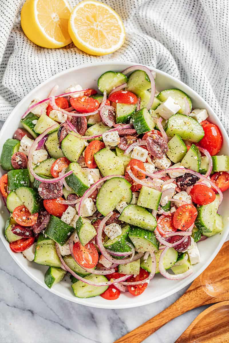 An overhead view of a large bowl filled with greek salad.