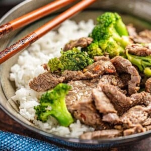 Takeout style beef and broccoli in a bowl.