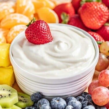 marshmallow fruit dip with a strawberry on top.